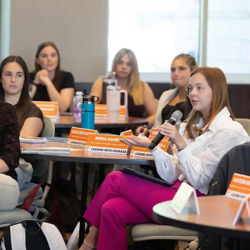 Students asking questions in class